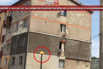 Soarele e sus pe cer iar stâlpii de iluminat nu știm de ce dracu ard la ora prânzului!