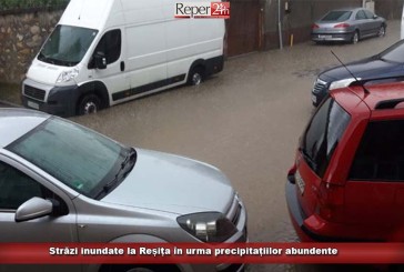 Străzi inundate la Reșița în urma precipitațiilor abundente