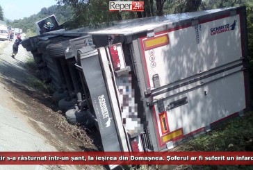 Un tir s-a răsturnat într-un șant, la ieșirea din Domașnea. Șoferul ar fi suferit un infarct!