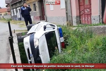 Fast and furious! Mașină de poliție răsturnată în șanț, la Obreja!