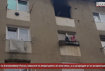 Incendiu la Caransebeș! Focul, izbucnit la etajul patru al unui bloc, s-a propagat și la acoperișul clădirii!
